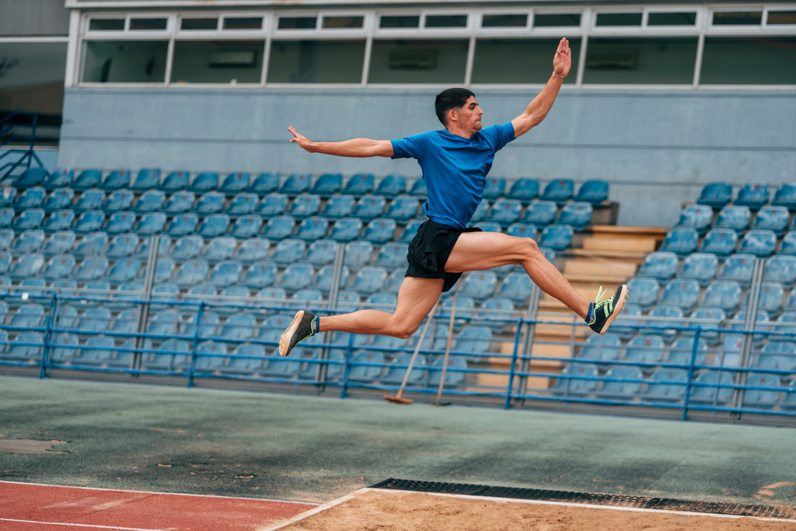 Long jump, Professional Male Athlete Jumping on Long Distance